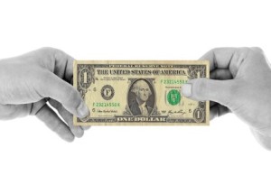 hands holding cash