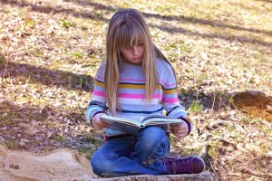 child reading book 